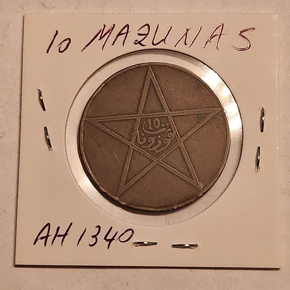 This is a vuntagw Moroccan 10 Mazunas bronze...